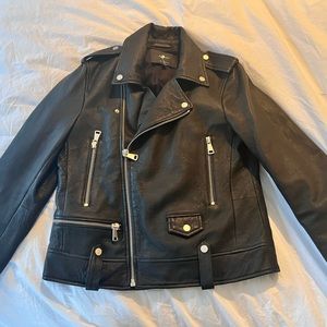 Black leather jacket with silver hardware